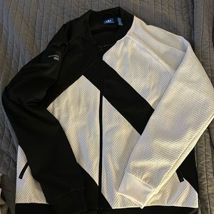 Black and white adidas light weight jacket. Size L